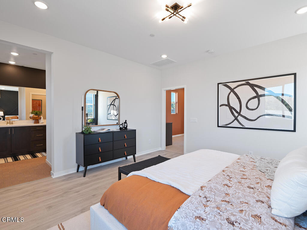 3822 Silvergrass Lane Piru, CA 93040 - Photo 14 of 24 a bedroom with a bed and a dresser