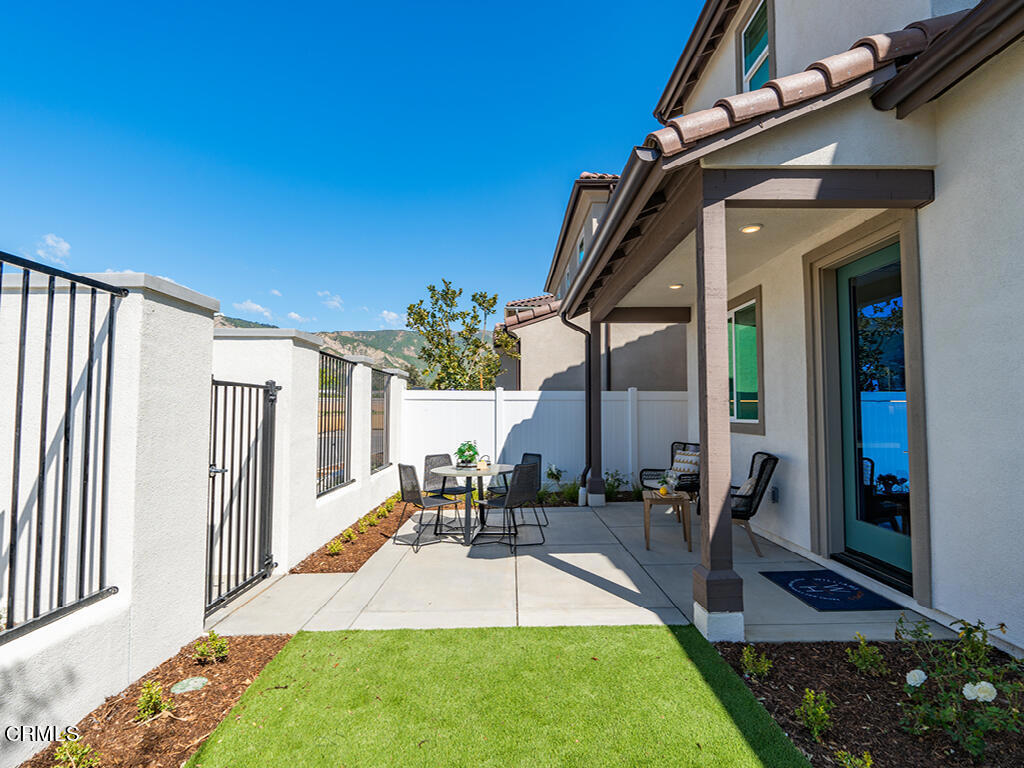 3822 Silvergrass Lane Piru, CA 93040 - Photo 20 of 24 a view of a house with backyard and porch