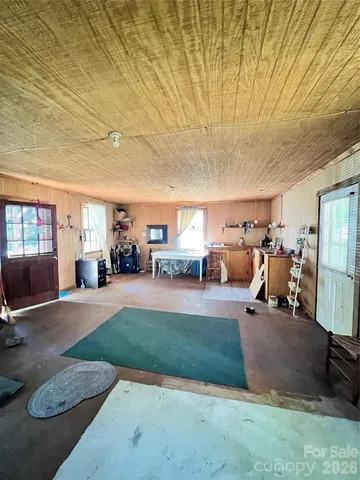 a view of backyard with green space