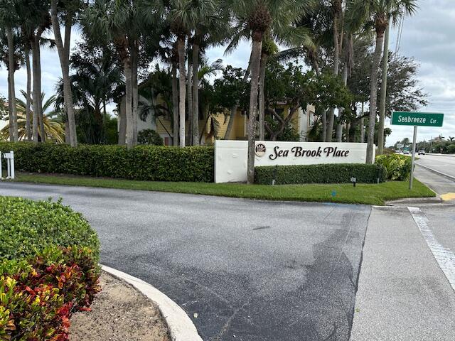226 Seabreeze Circle Jupiter, FL 33477 - Photo 17 of 22 a sign that is on the side of the road