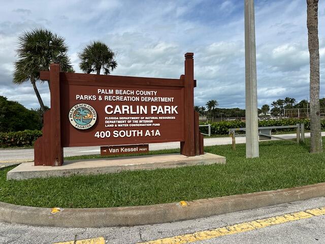 226 Seabreeze Circle Jupiter, FL 33477 - Photo 18 of 22 a sign on the side of the road