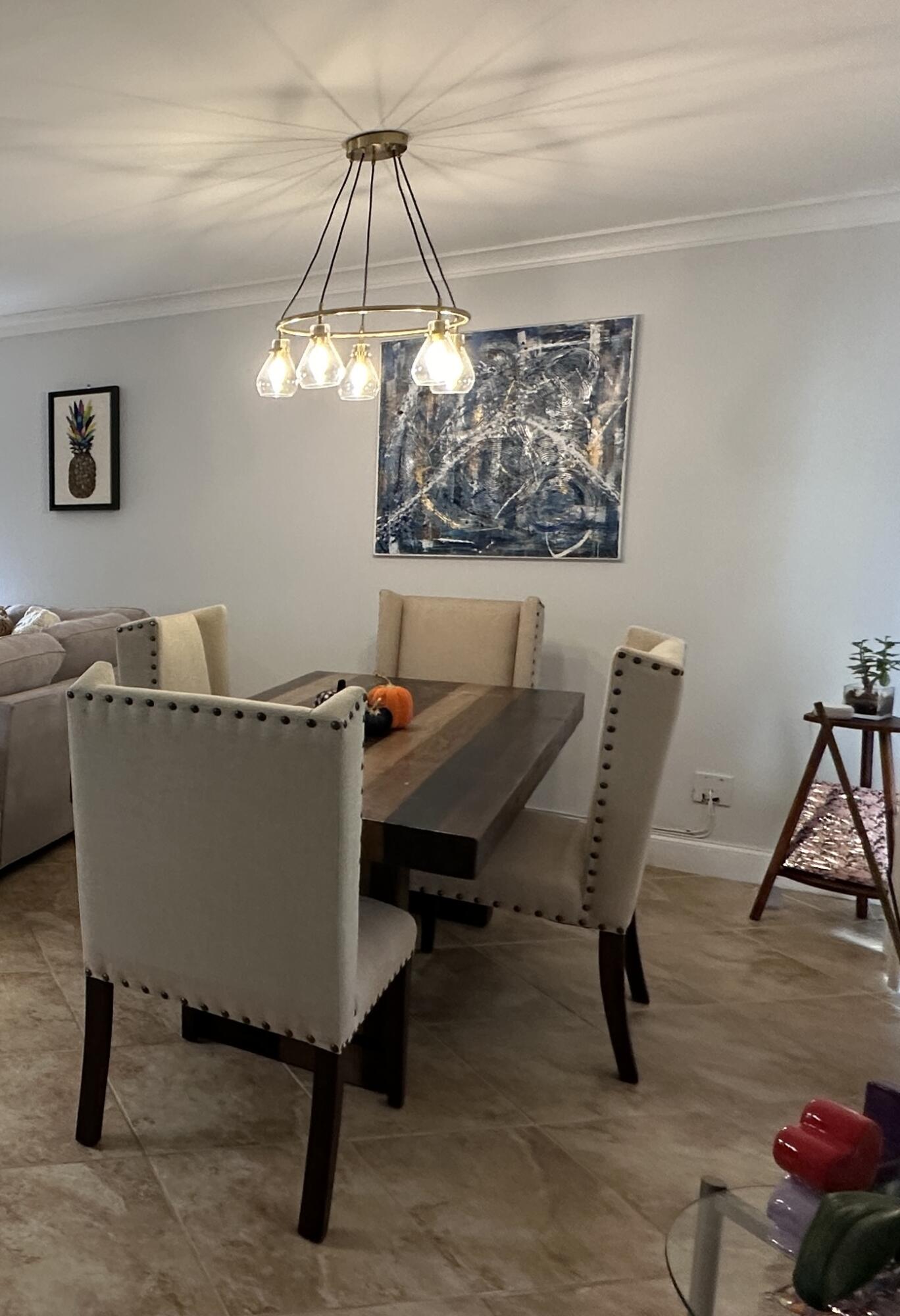 226 Seabreeze Circle Jupiter, FL 33477 - Photo 6 of 22 a view of a dining room with furniture