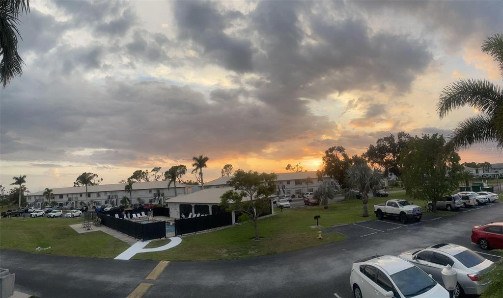 26485 Rampart Boulevard, Unit A27 Punta Gorda, FL 33983 - Photo 16 of 19 a view of multiple houses with outdoor space