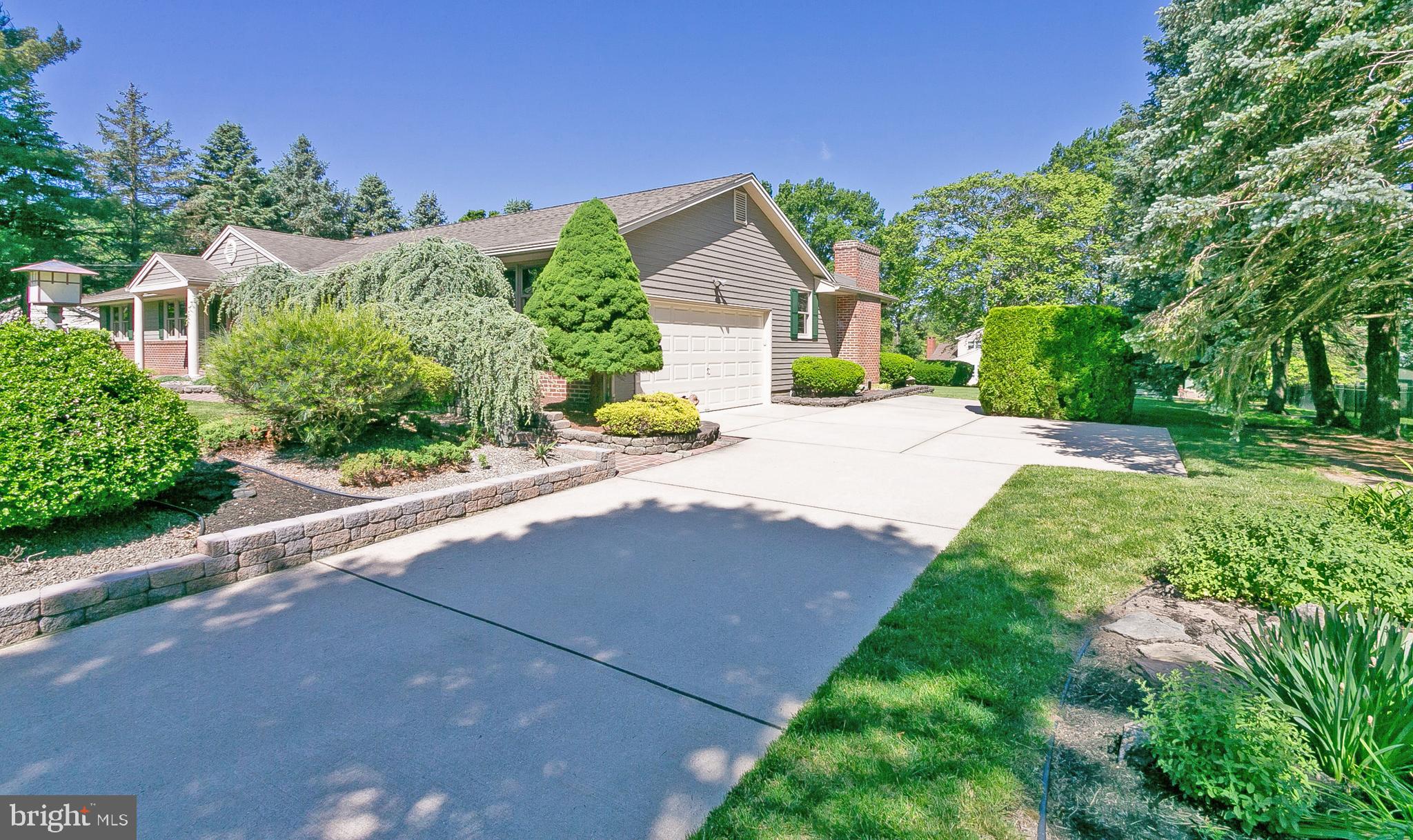 6 Edgewood Road Robbinsville, NJ 08691 - Photo 2 of 37 concrete drive and side entry garage