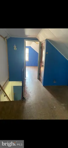 a view of lot of kitchen and wooden floor