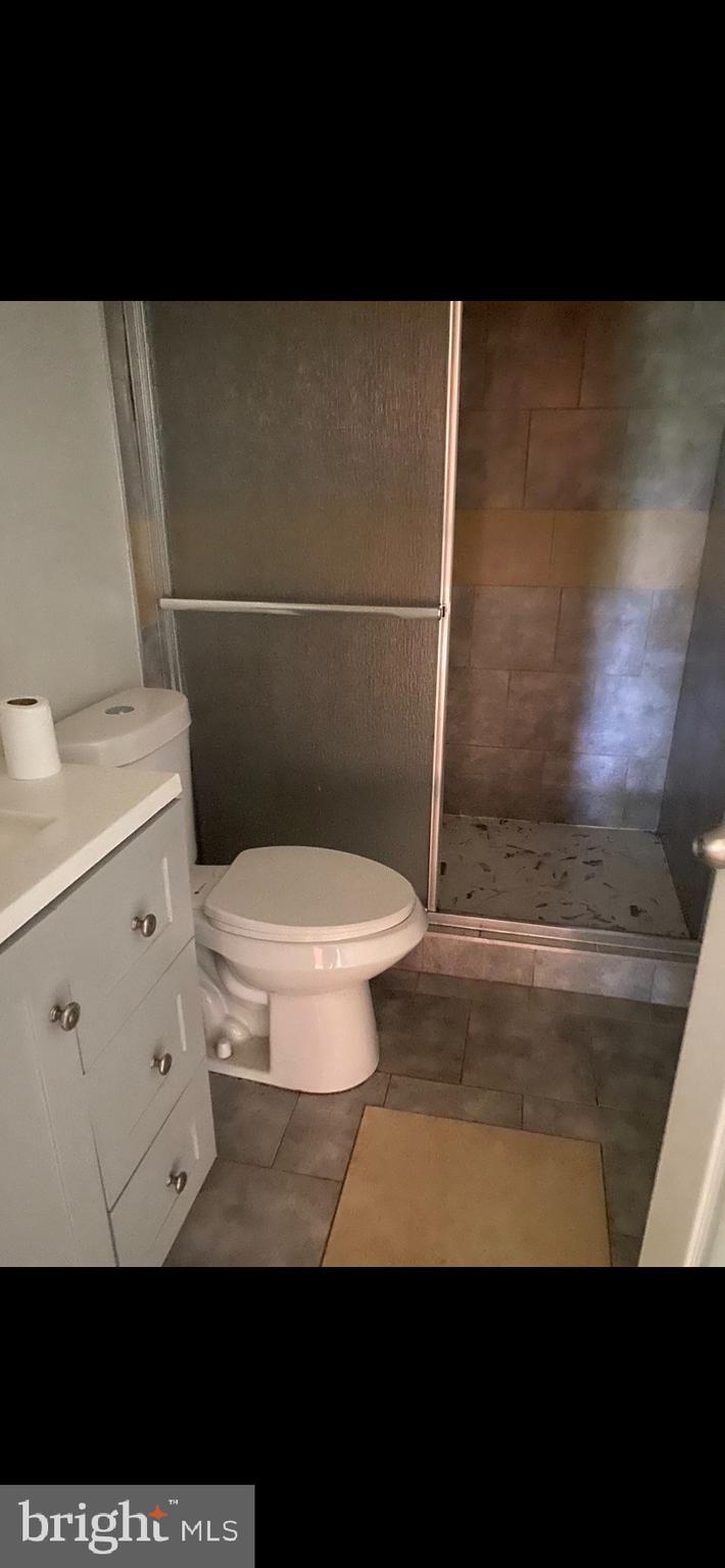 6800 Crossway Baltimore, MD 21222 - Photo 9 of 14 a bathroom with a toilet and a sink