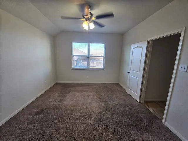 a view of kitchen with granite countertop cabinets a sink and a stove top oven