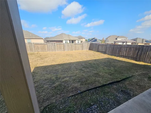 a view of outdoor space and yard