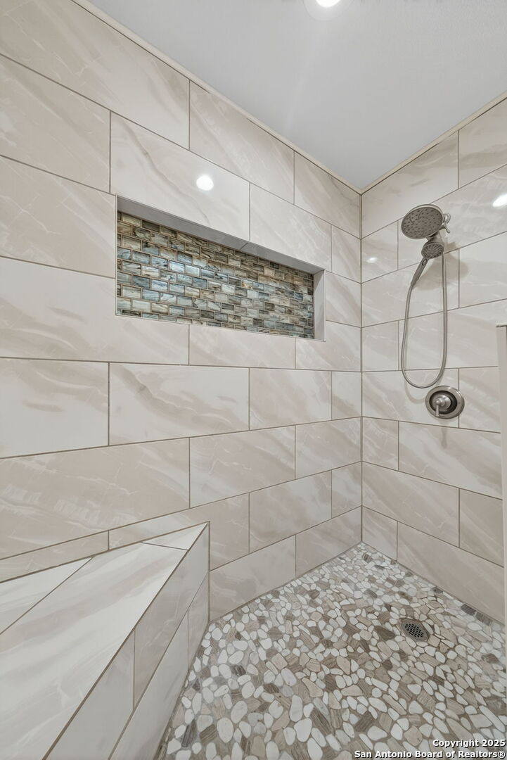 231 Hayden Road Pleasanton, TX 78064 - Photo 22 of 36 a bathroom with a shower
