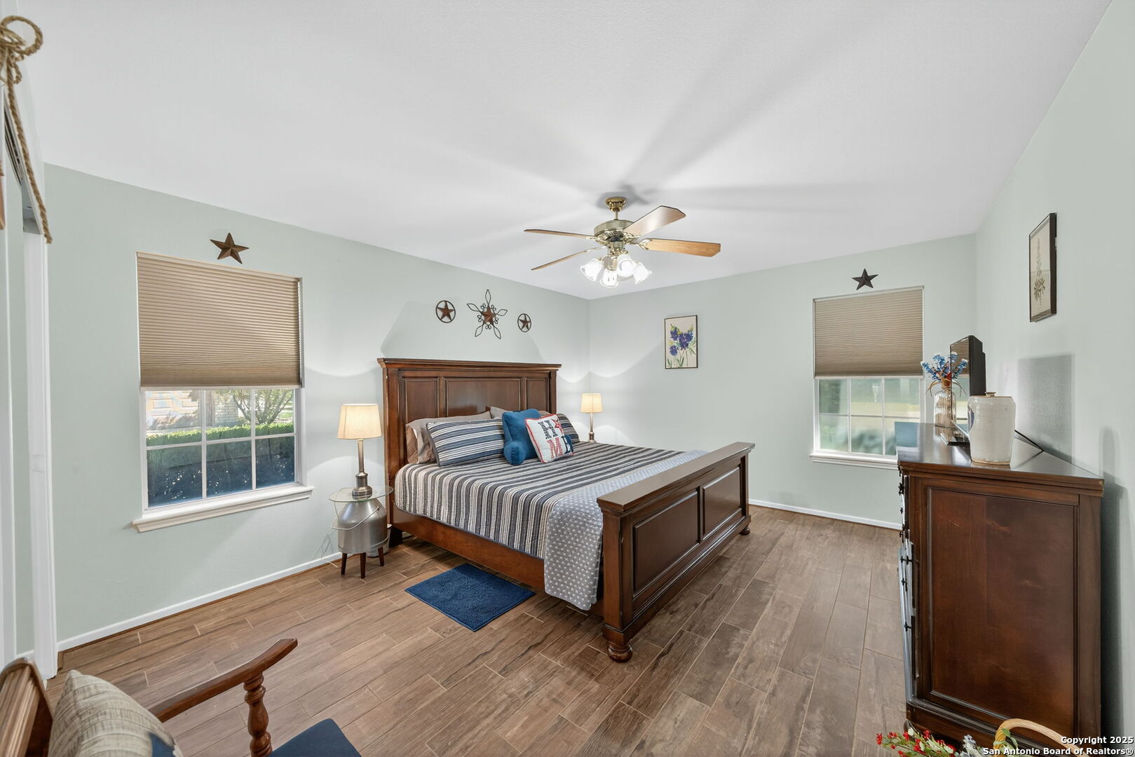 231 Hayden Road Pleasanton, TX 78064 - Photo 25 of 36 a bedroom with a bed and a flat tv screen on dresser
