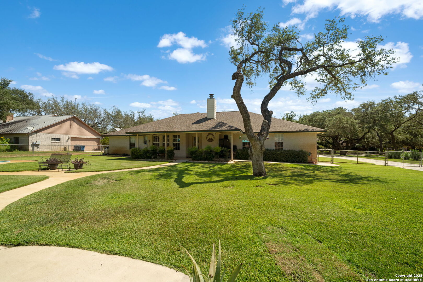 231 Hayden Road Pleasanton, TX 78064 - Photo 31 of 36 a front view of house with yard and swimming pool
