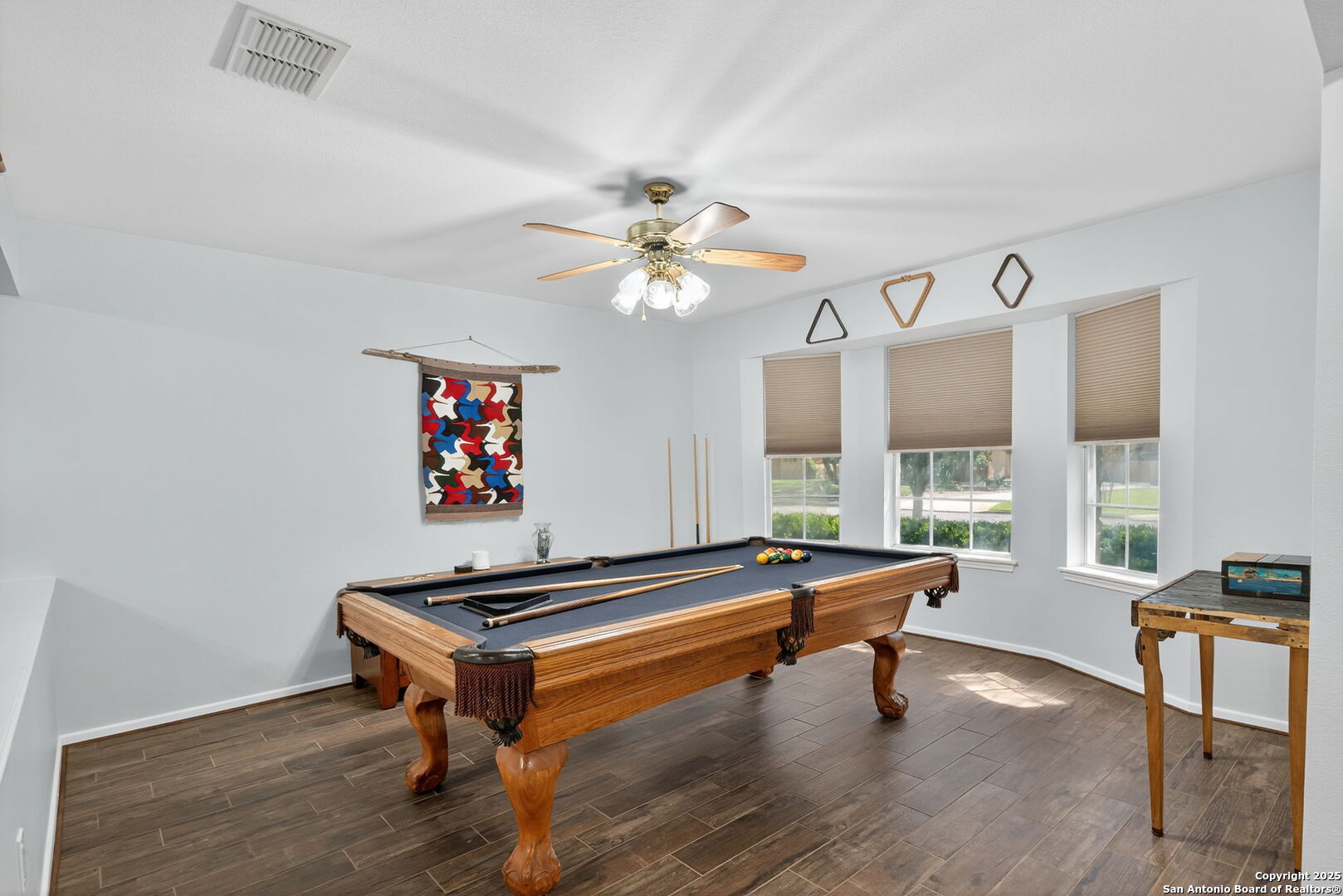 231 Hayden Road Pleasanton, TX 78064 - Photo 7 of 36 a room with pool table and windows