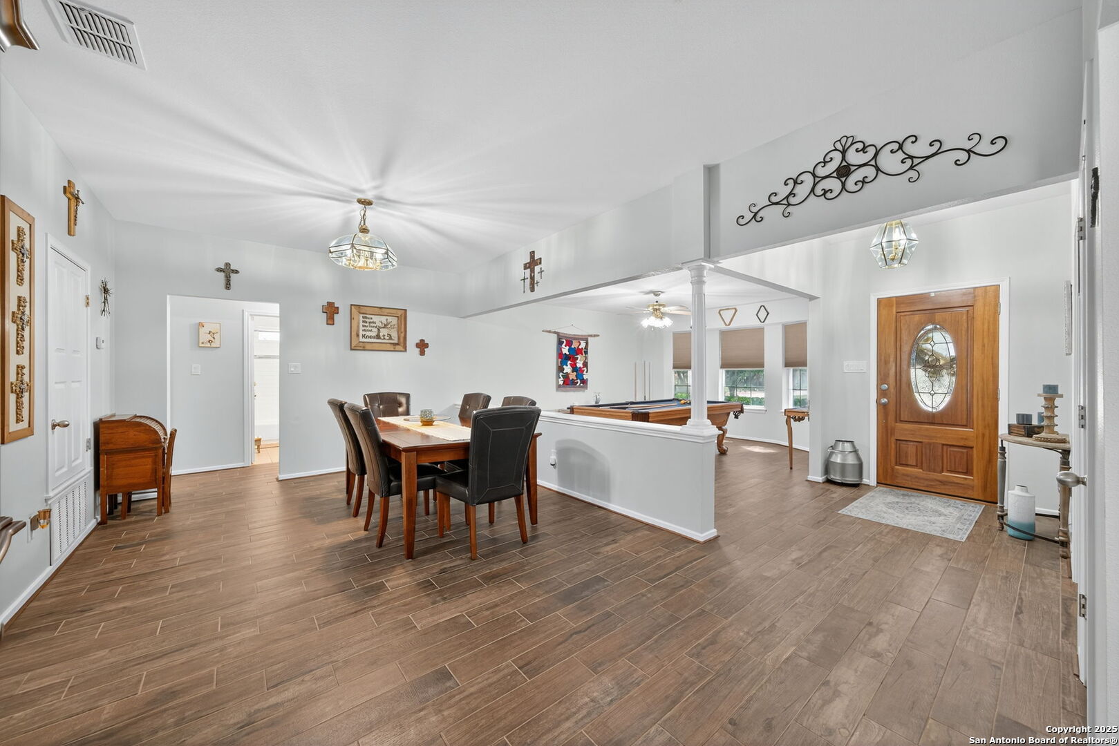 231 Hayden Road Pleasanton, TX 78064 - Photo 10 of 36 a living room with furniture and a wooden floor