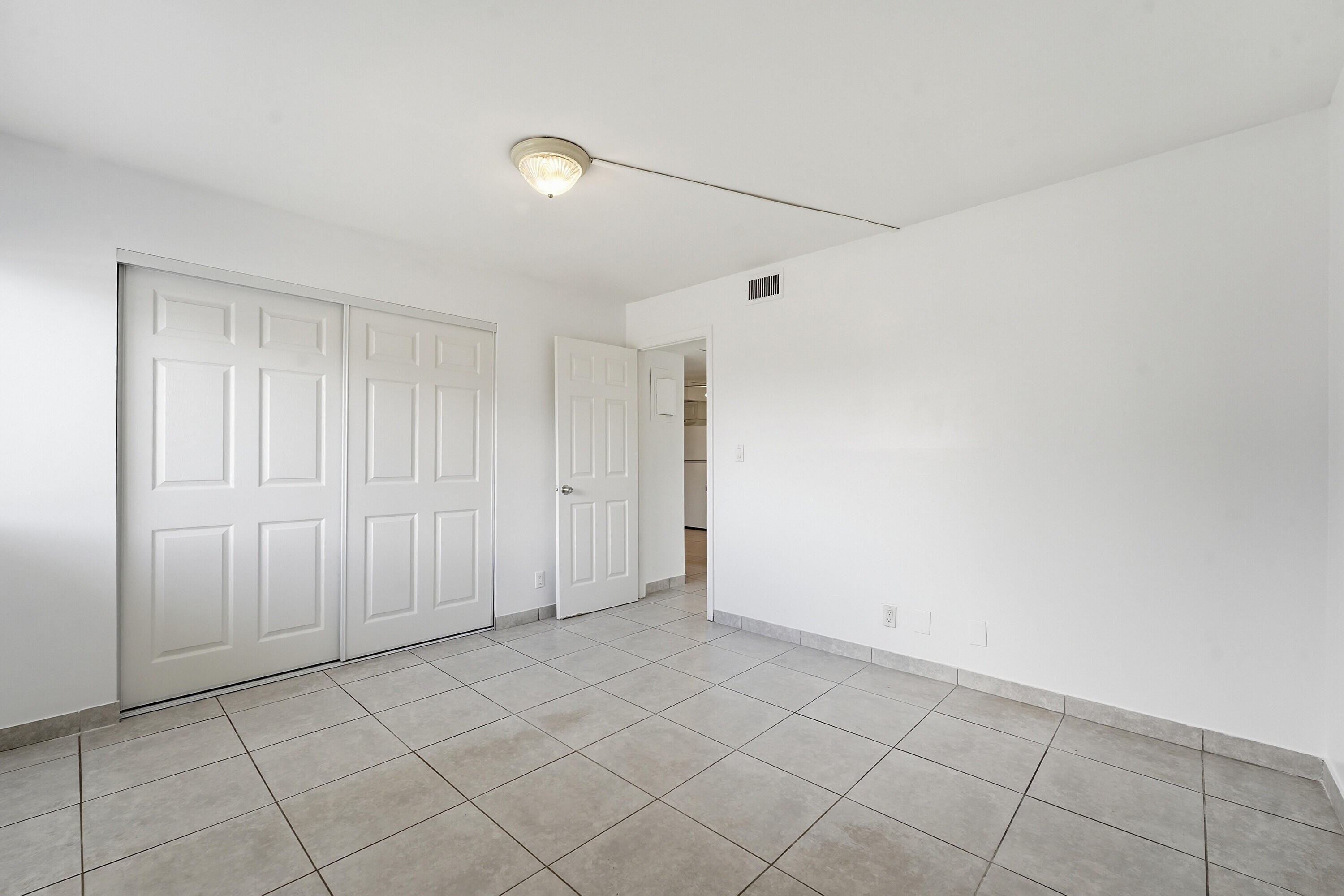 2671 Riverside Drive, Unit 1 Coral Springs, FL 33065 - Photo 13 of 25 a view of an empty room