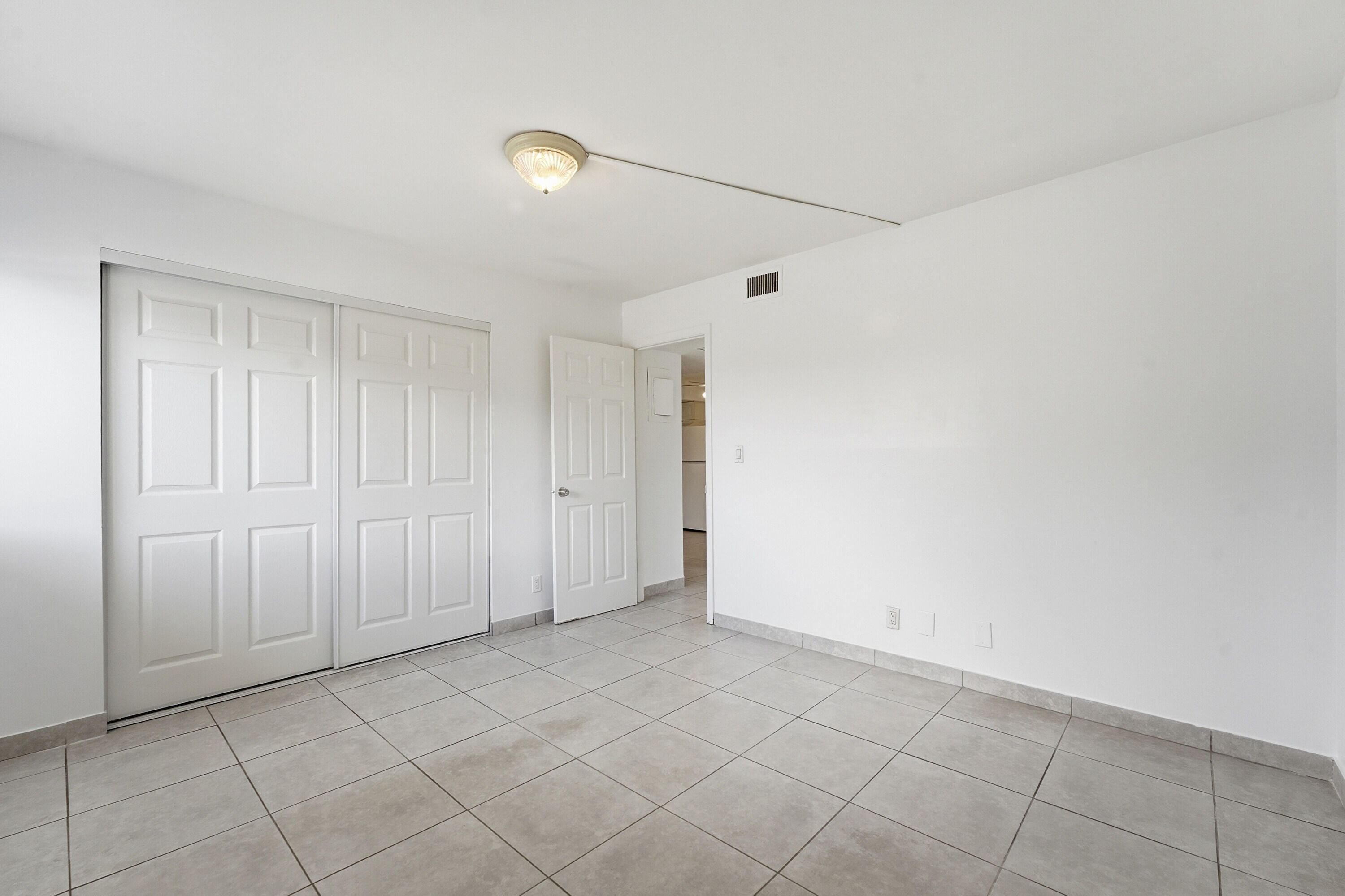 2671 Riverside Drive, Unit 1 Coral Springs, FL 33065 - Photo 18 of 25 a view of an empty room