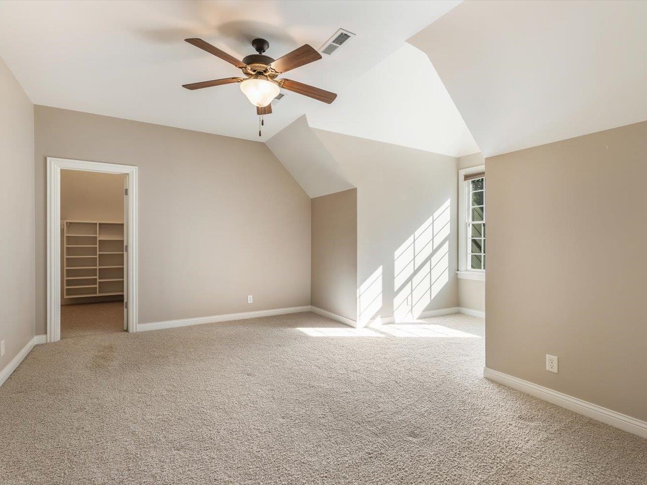 12936 Melrose Road Caledonia, IL 61011 - Photo 44 of 94 a view of an empty room with a ceiling fan