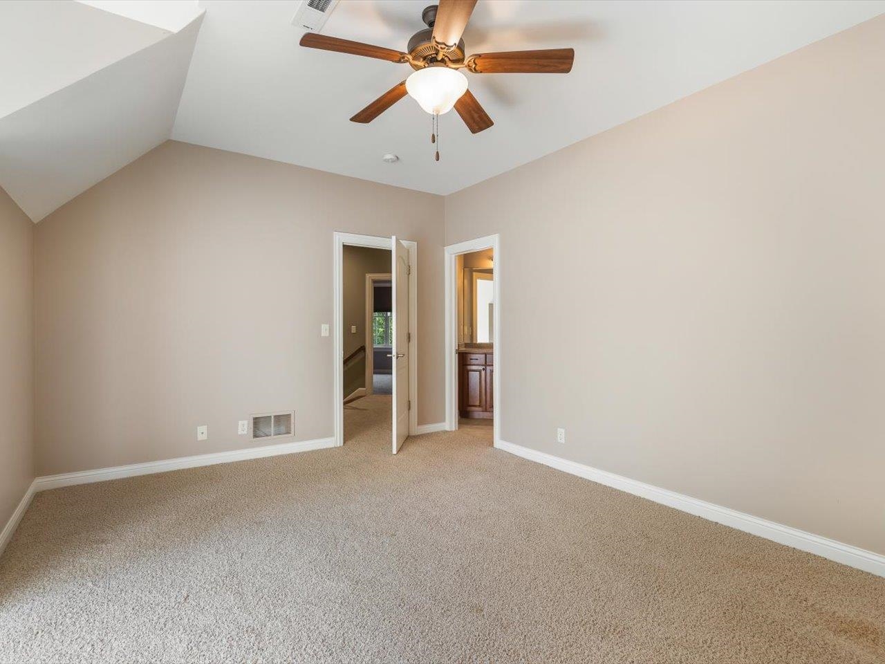 12936 Melrose Road Caledonia, IL 61011 - Photo 45 of 94 an empty room with chandelier fan