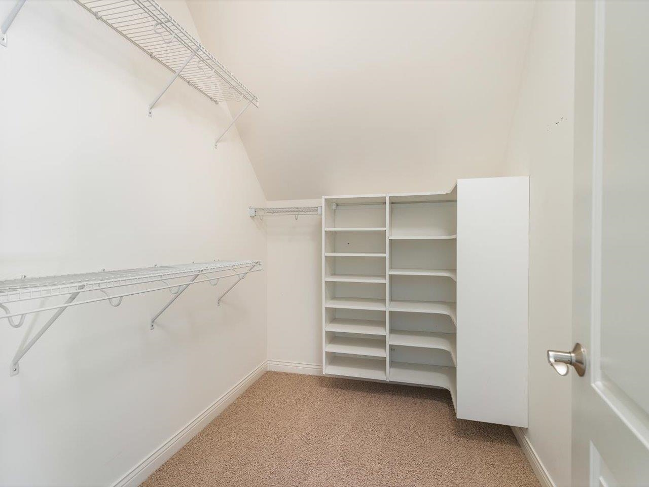 12936 Melrose Road Caledonia, IL 61011 - Photo 46 of 94 a view of walk in closet with empty racks