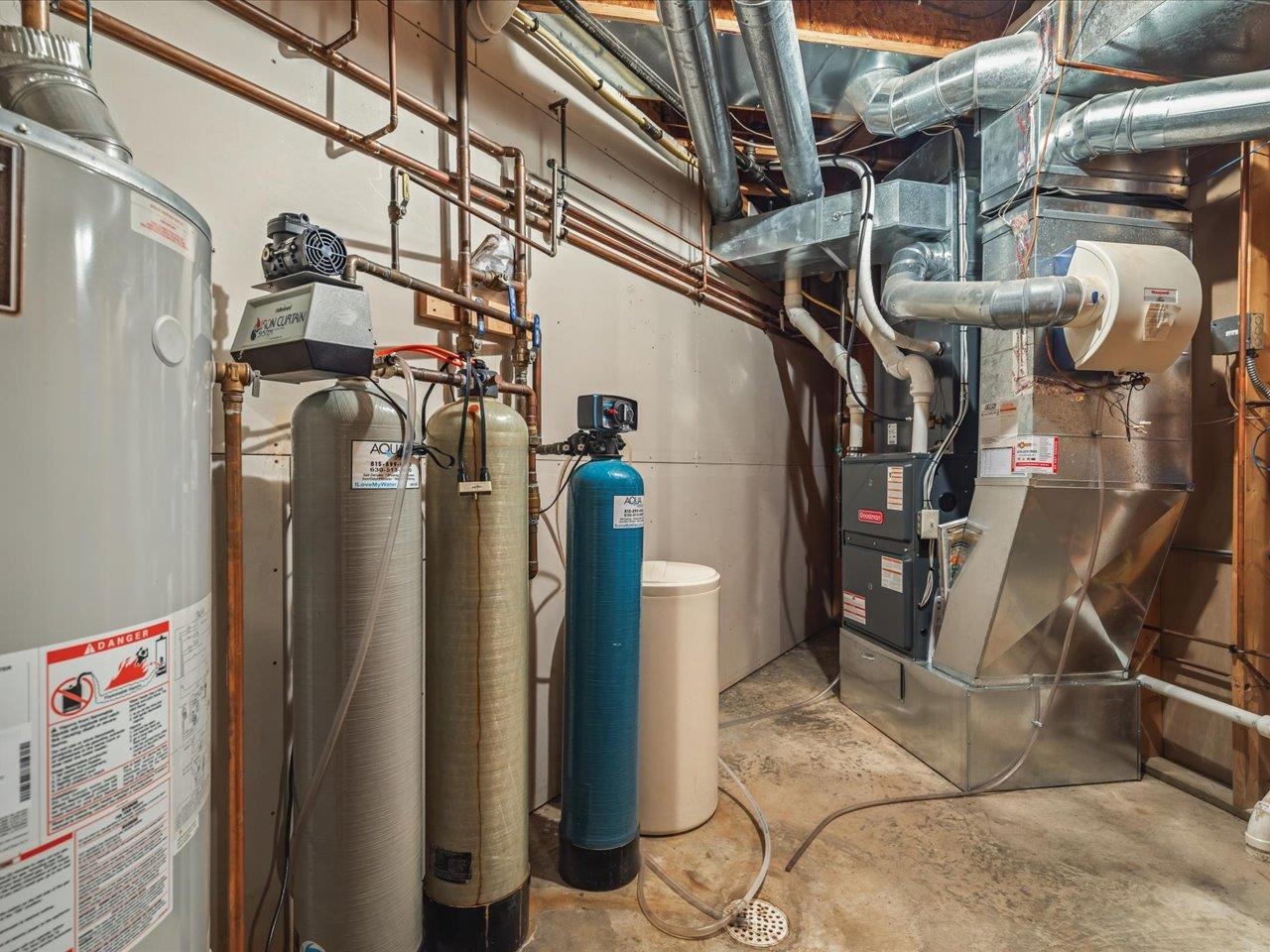 12936 Melrose Road Caledonia, IL 61011 - Photo 74 of 94 a view of storage and utility room with racks
