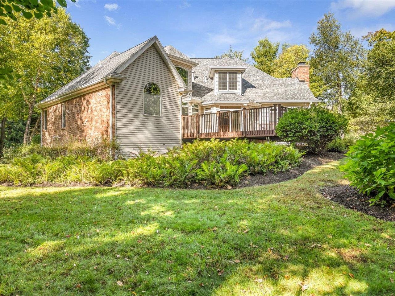 12936 Melrose Road Caledonia, IL 61011 - Photo 82 of 94 a front view of a house with a garden