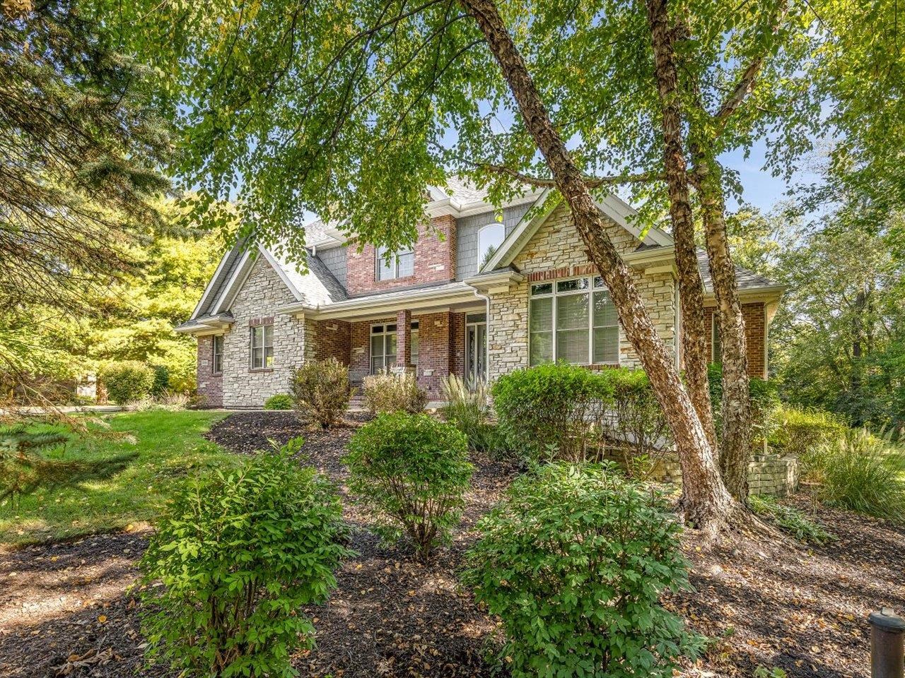 12936 Melrose Road Caledonia, IL 61011 - Photo 84 of 94 a front view of a house with a yard