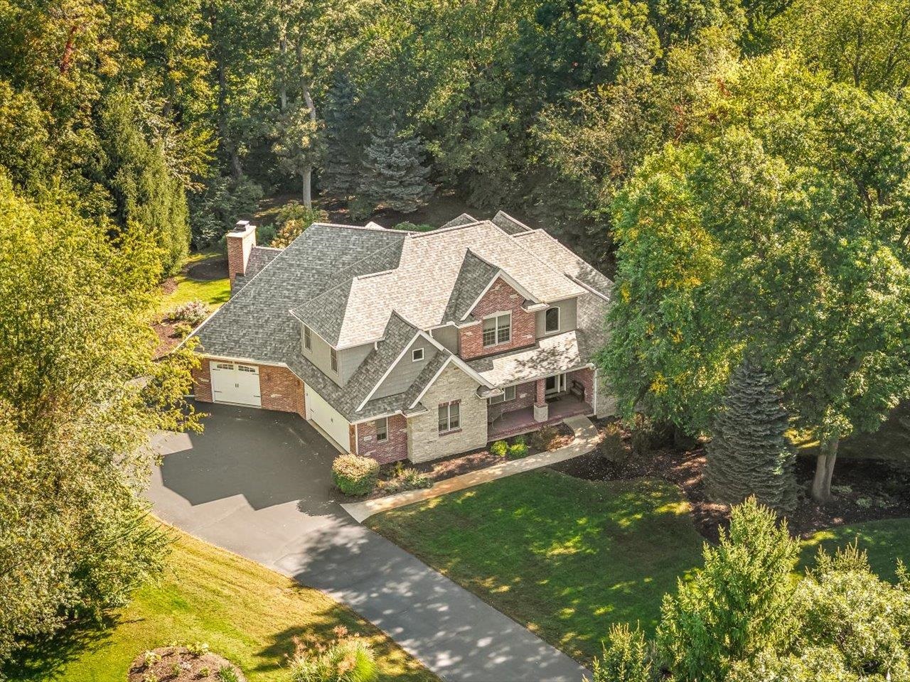12936 Melrose Road Caledonia, IL 61011 - Photo 87 of 94 an aerial view of a house with a yard basket ball court and outdoor seating