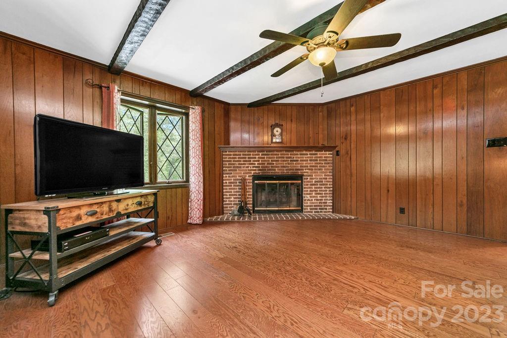 330 Beau Valley Road Tryon, NC 28782 - Photo 18 of 42 a living room with furniture and a flat screen tv