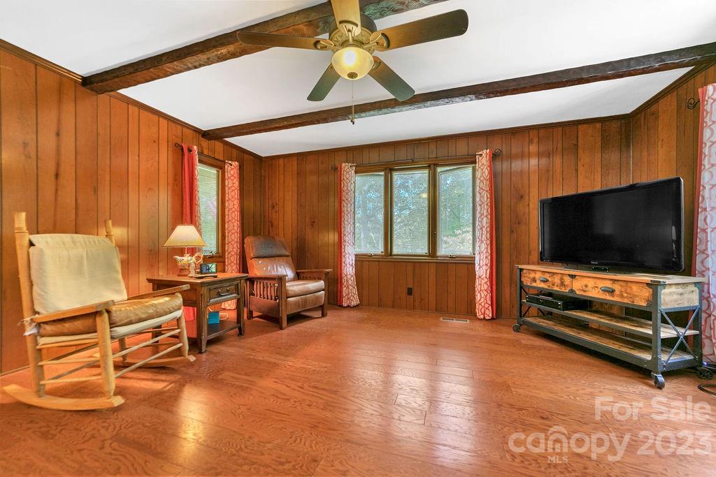 330 Beau Valley Road Tryon, NC 28782 - Photo 19 of 42 a living room with furniture and a flat screen tv