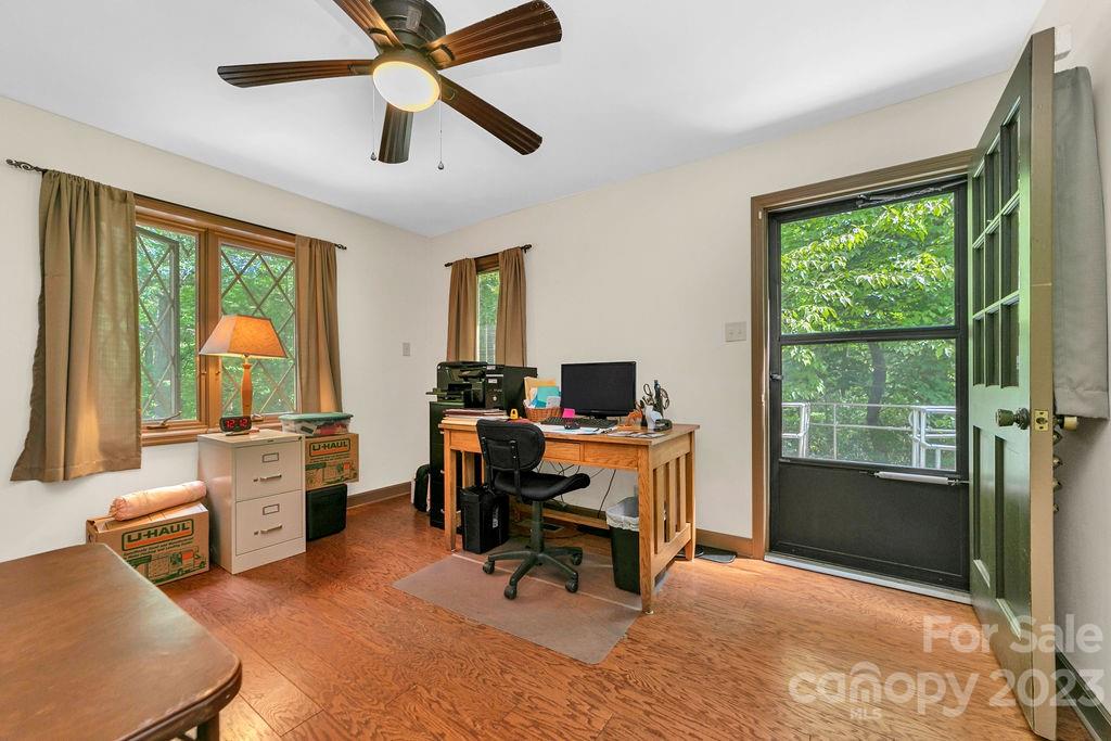 330 Beau Valley Road Tryon, NC 28782 - Photo 27 of 42 a view of a workspace with furniture and a window