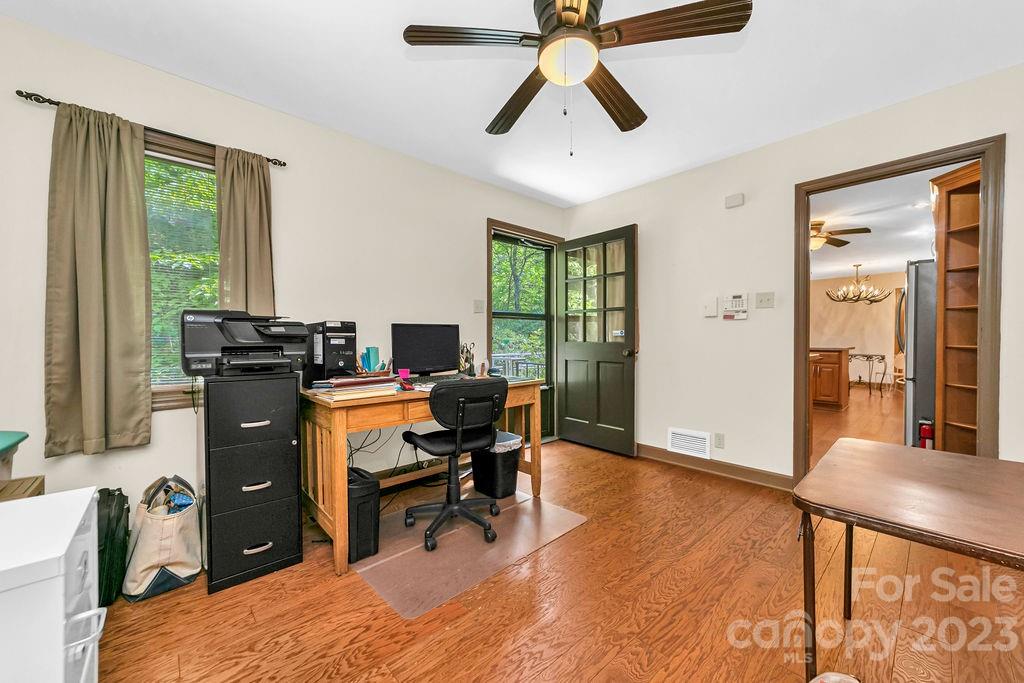 330 Beau Valley Road Tryon, NC 28782 - Photo 28 of 42 a view of a workspace with furniture and a window
