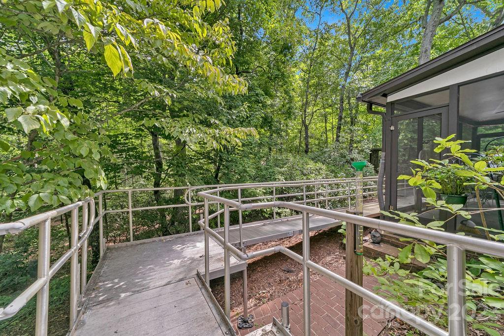 330 Beau Valley Road Tryon, NC 28782 - Photo 33 of 42 a view of a balcony with chairs