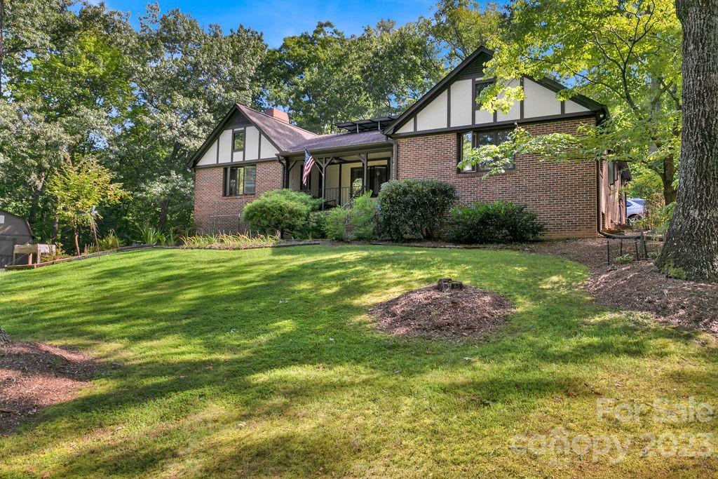 330 Beau Valley Road Tryon, NC 28782 - Photo 38 of 42 a front view of house with yard and green space