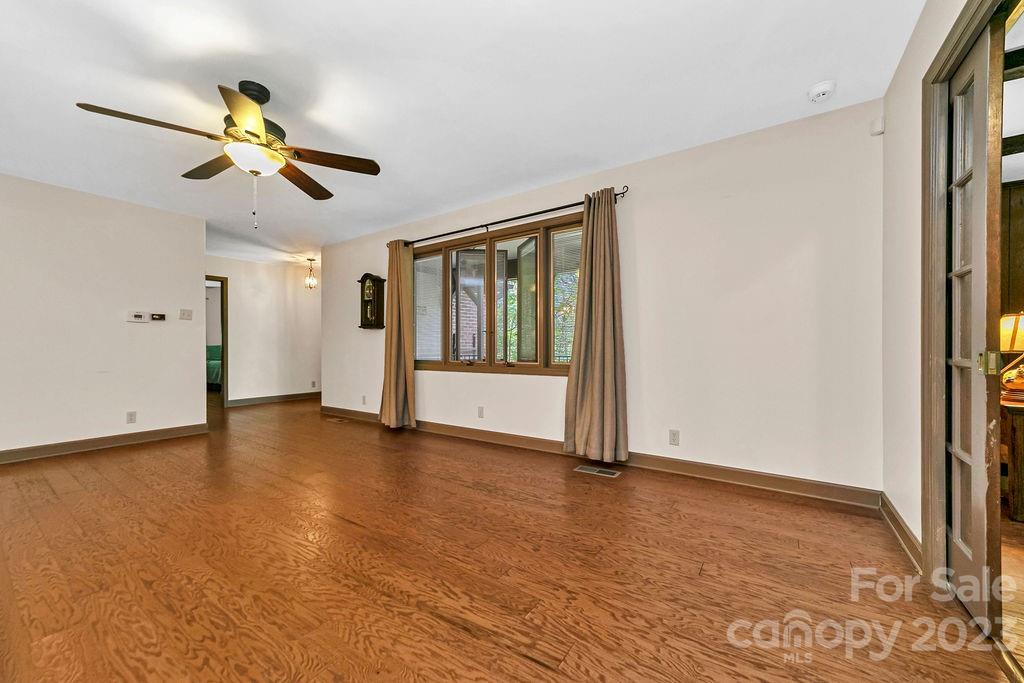 330 Beau Valley Road Tryon, NC 28782 - Photo 6 of 42 a view of empty room with wooden floor