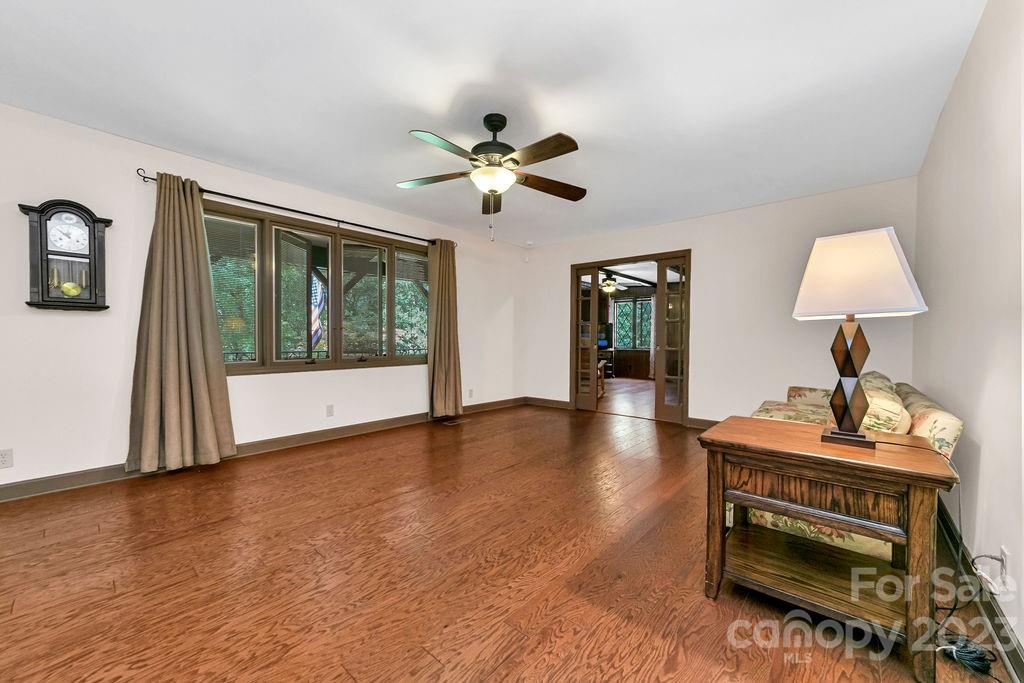 330 Beau Valley Road Tryon, NC 28782 - Photo 7 of 42 a living room with furniture and a window