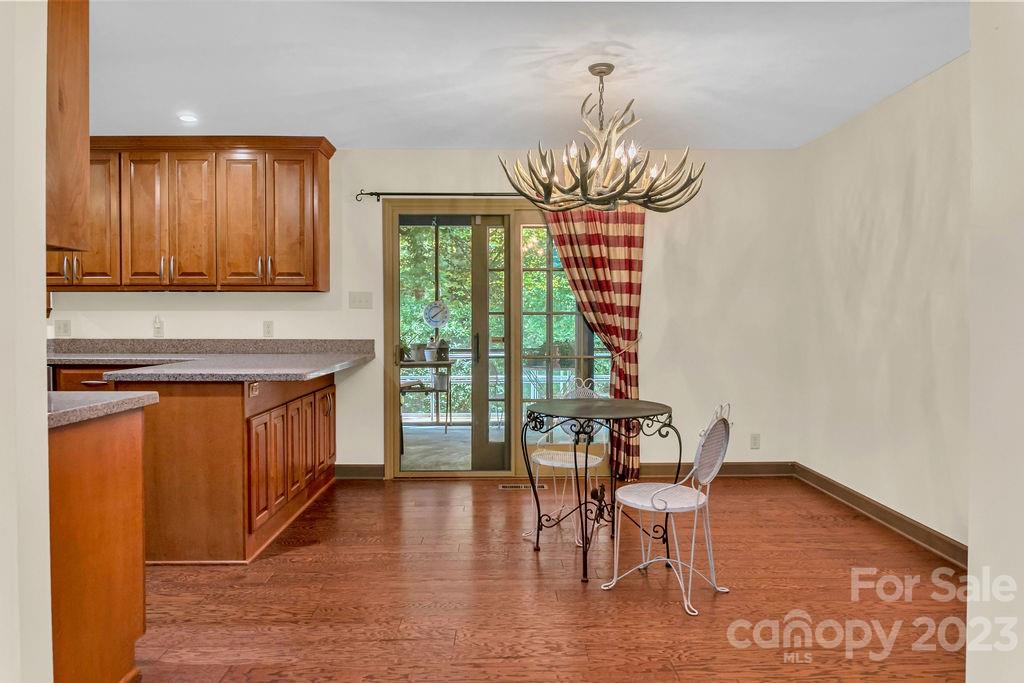 330 Beau Valley Road Tryon, NC 28782 - Photo 9 of 42 a living room with furniture and a wooden floor
