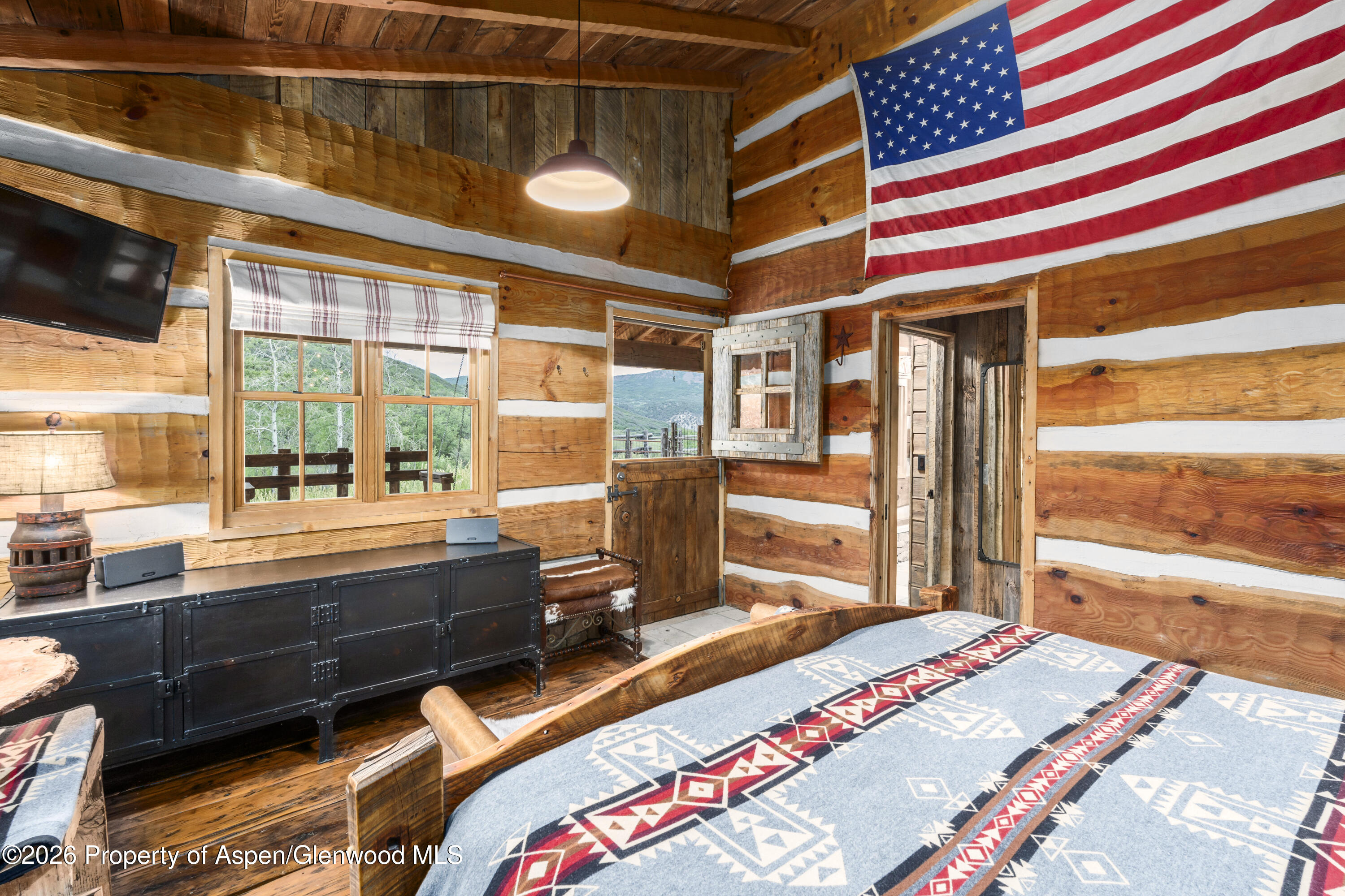 1350 Old Herron Road Basalt, CO 81621 - Photo 26 of 81 a bed room with a bed and a large window