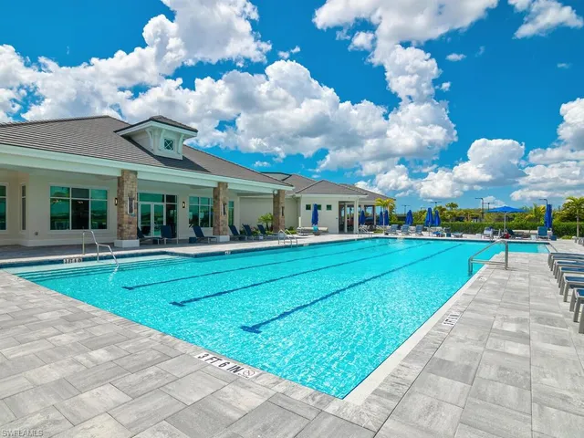 a view of an outdoor space pool patio and ocean
