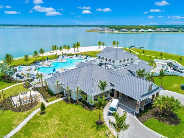 a view of a house with garden and patio