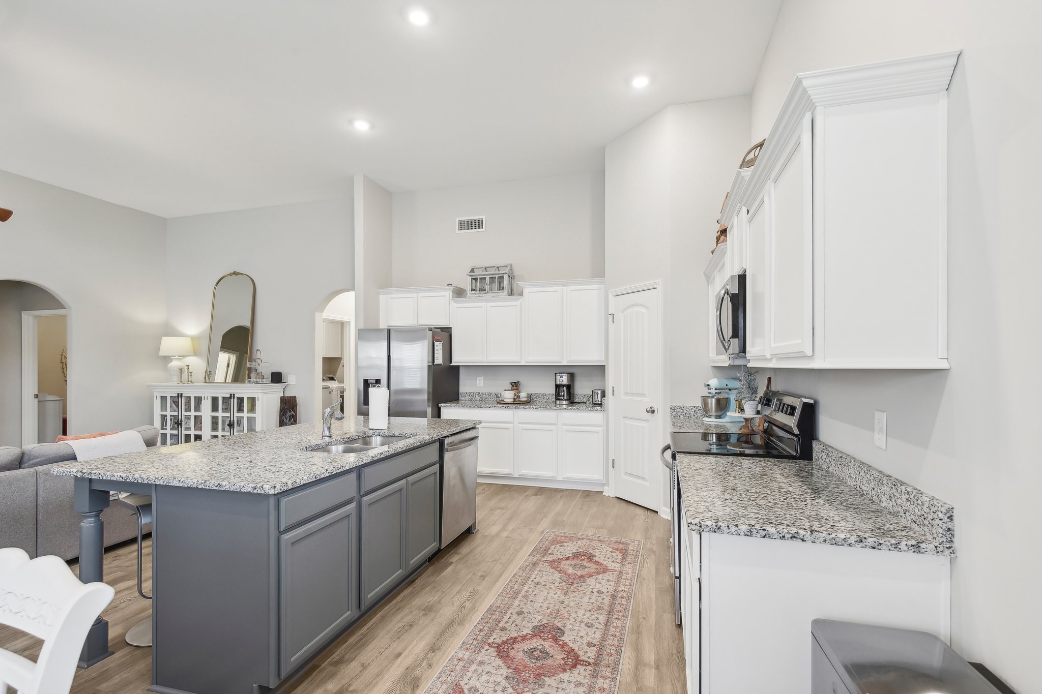 211 Thorpe Dr Spring Hill Spring Hill, TN 37174 - Photo 19 of 38 a kitchen with a sink stove and cabinets