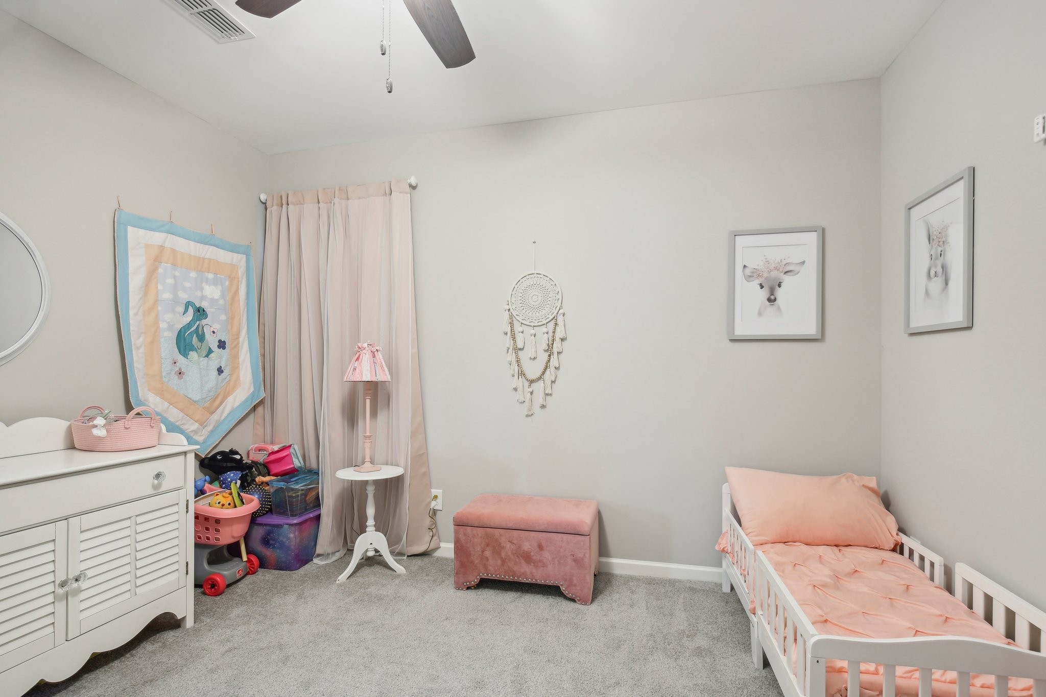 211 Thorpe Dr Spring Hill Spring Hill, TN 37174 - Photo 28 of 38 a room with furniture and baby crib