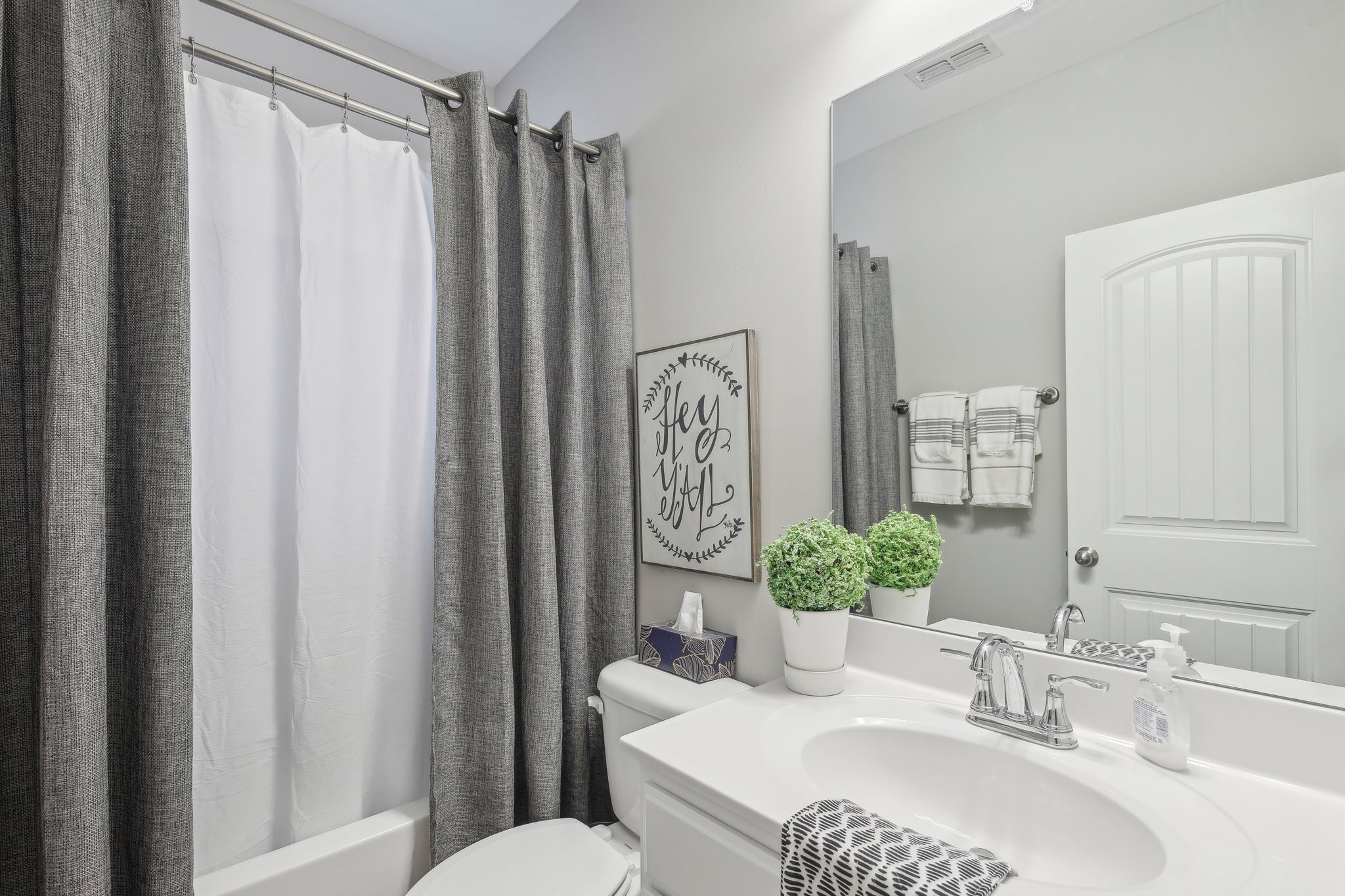 211 Thorpe Dr Spring Hill Spring Hill, TN 37174 - Photo 29 of 38 a bathroom with a granite countertop sink toilet and shower
