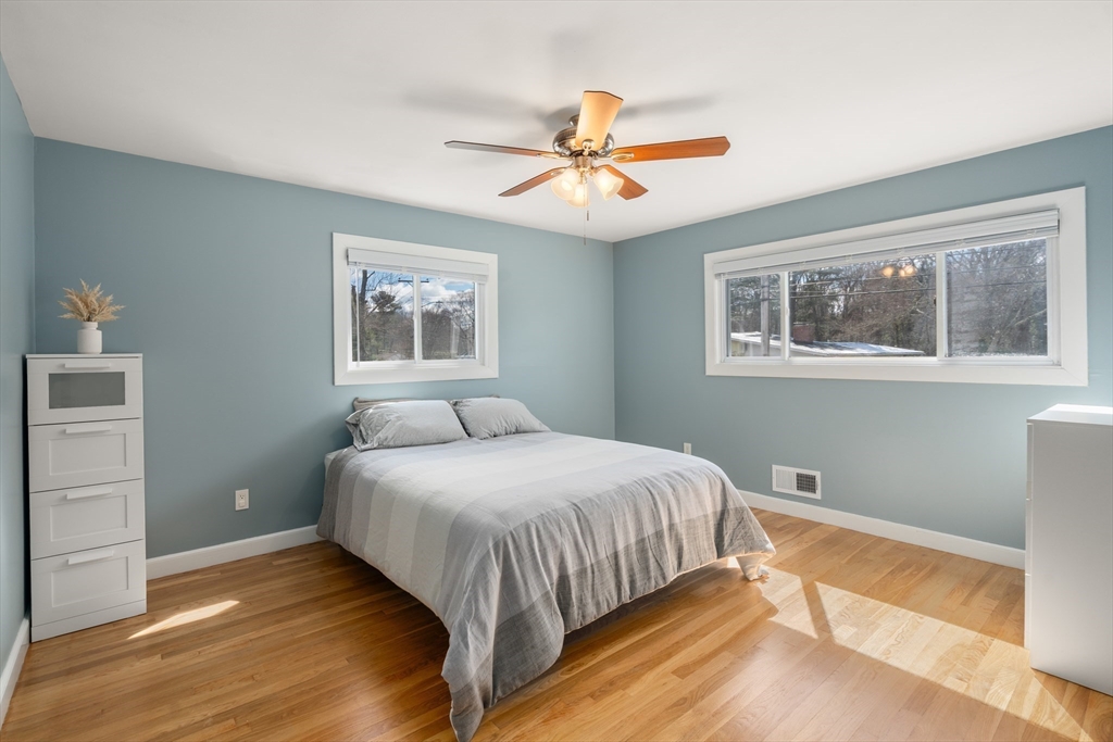 13 Berkeley Road Framingham, MA 01701 - Photo 17 of 32 a bedroom with a large bed and a window