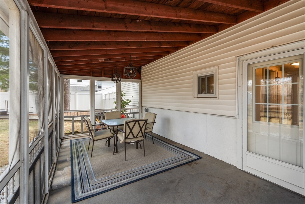 13 Berkeley Road Framingham, MA 01701 - Photo 22 of 32 a dining room with furniture and outdoor view