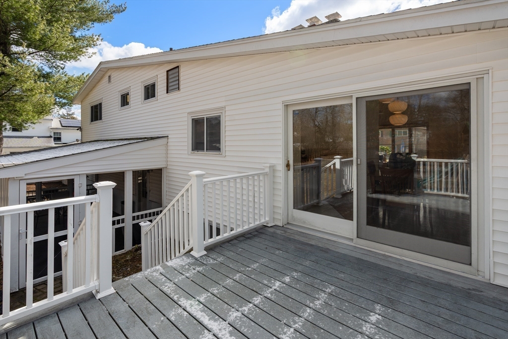 13 Berkeley Road Framingham, MA 01701 - Photo 24 of 32 a view of a house with a balcony