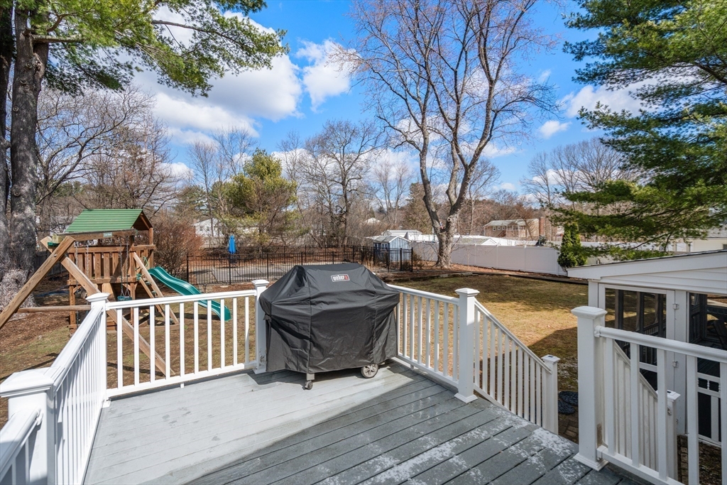 13 Berkeley Road Framingham, MA 01701 - Photo 25 of 32 a view of balcony with wooden floor and seating space