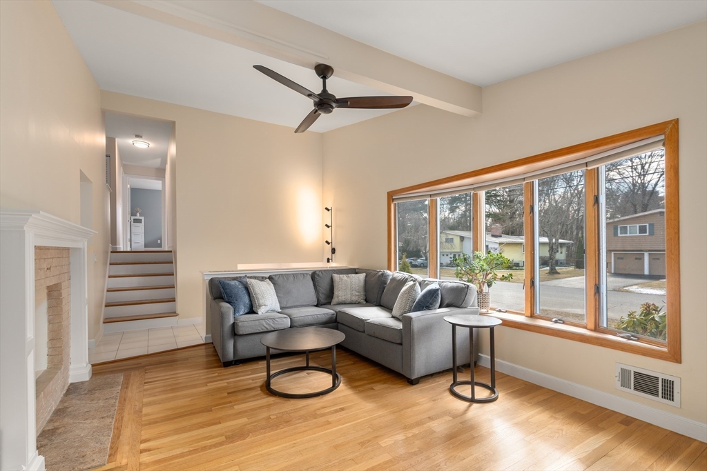 13 Berkeley Road Framingham, MA 01701 - Photo 4 of 32 a living room with furniture and a large window