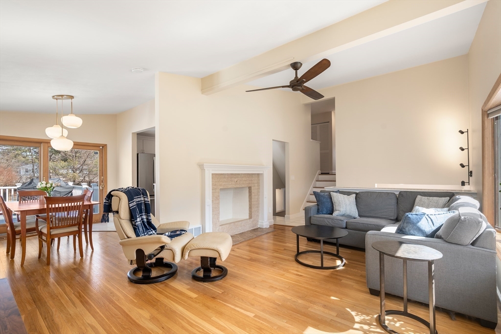13 Berkeley Road Framingham, MA 01701 - Photo 5 of 32 a living room with furniture and a fireplace
