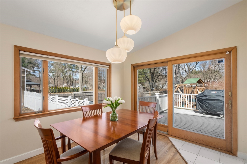 13 Berkeley Road Framingham, MA 01701 - Photo 7 of 32 a view of a dining room with furniture wooden floor and a chandelier