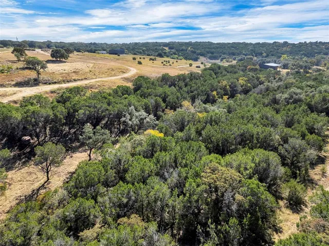 a view of a lake view with houses in the background