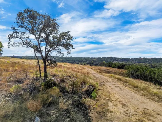 a view of a lake with mountain
